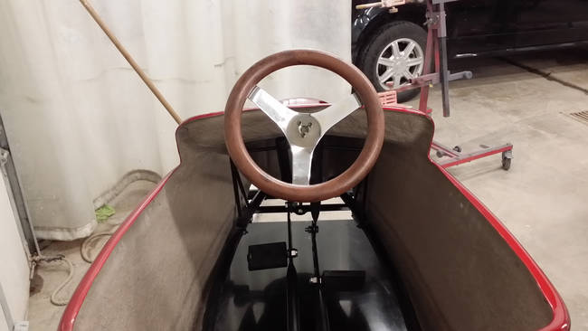 He added a faux wood steering wheel to match the classiness of the car's exterior.