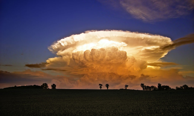 This is known as a Cumulonimbus Incus, or "anvil cloud."