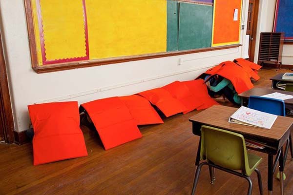 The company is encouraging school administrators to make its protective blankets part of their protocols.