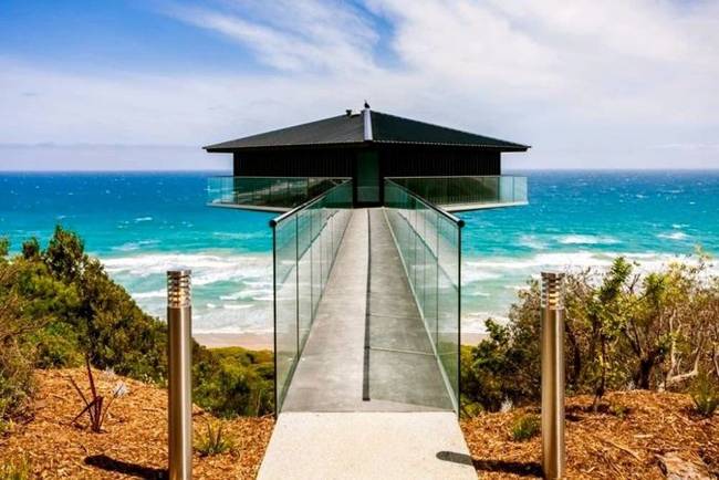 The Pole House is suspended 130 feet above Fairhaven Beach along the Great Ocean Road. It comes complete with floor-to-ceiling retractable glass walls, revealing views unlike any other from Aireys Inlet to Lorne.