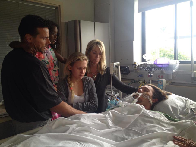 The family gathered by Connor's hospital bed.