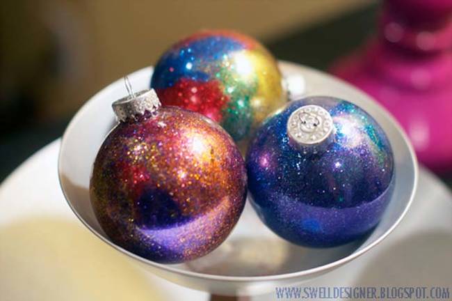 Glittery galaxy ornaments are sure to grab your holiday guests' attention.