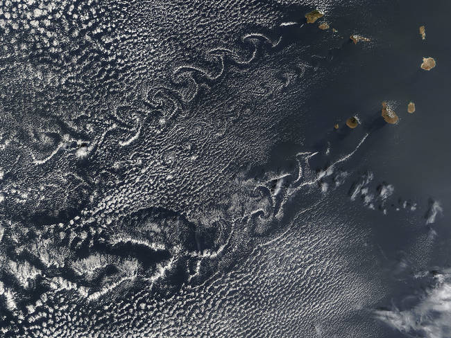 Air moving around the Cape Verde Islands causes this horizontal vortex in the clouds, as seen from above.