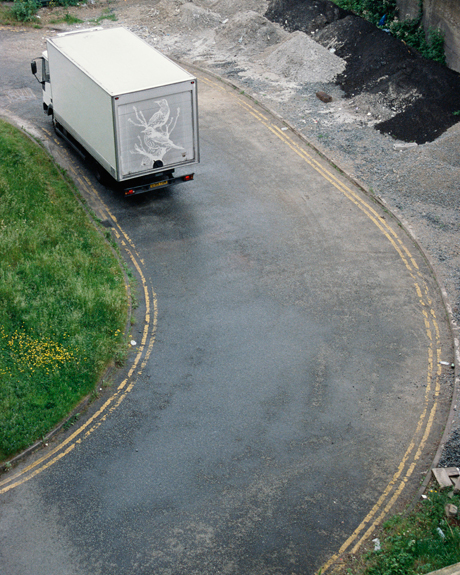 Caution: bend in the road and unexpected amazing artwork.