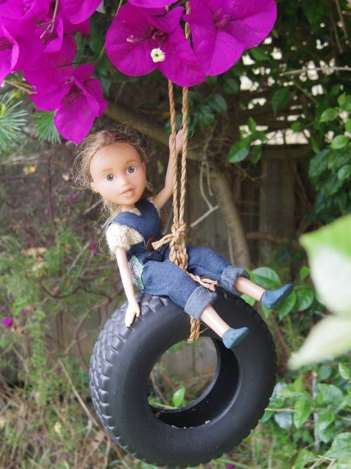 <p>The artist likes to photograph her new dolls outside, and hopes that the images will encourage kids to play in and appreciate nature. </p>