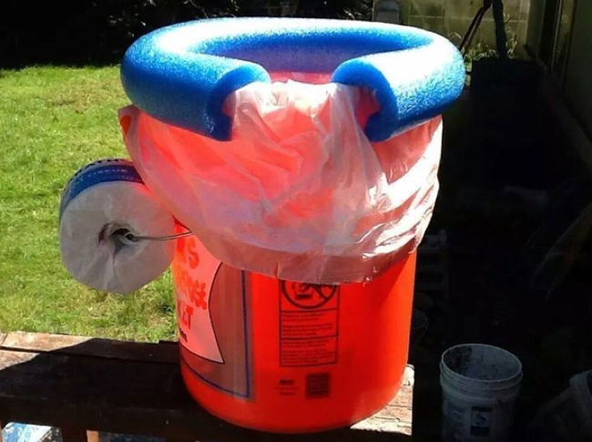 21.) Bucket Toilet With Pool Noodle Seat