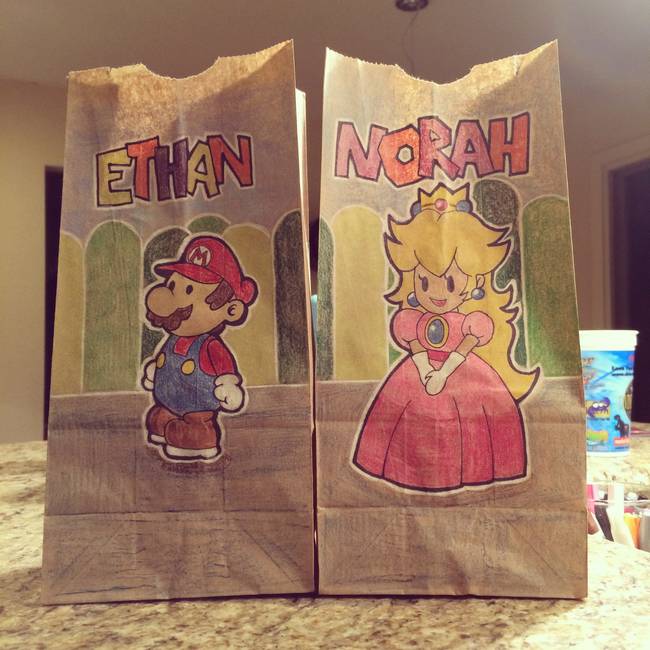 This mom decided she was gonna make her kids' lunch bags a little extra special by drawing awesome pictures on each bag.