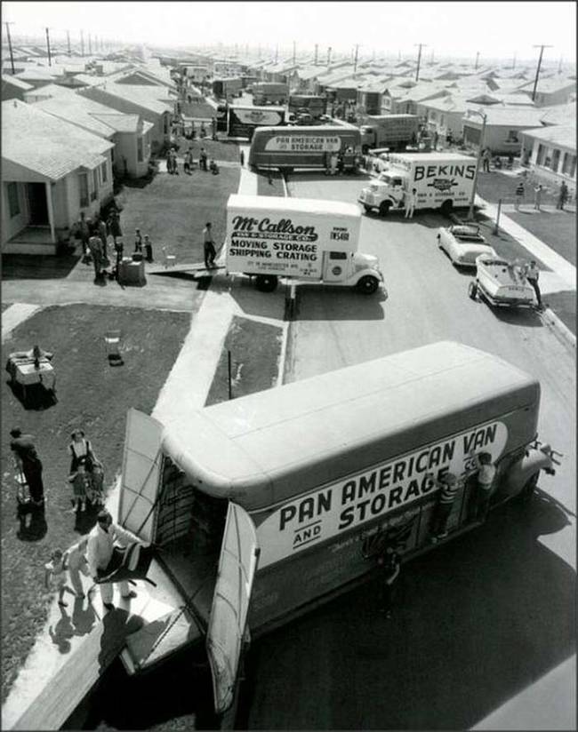 Moving day in the 1950s suburbs.