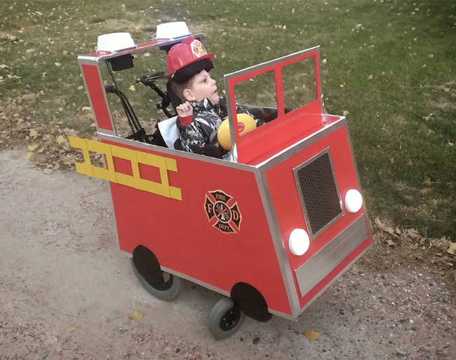 Here's his son in his very own fire-truck.