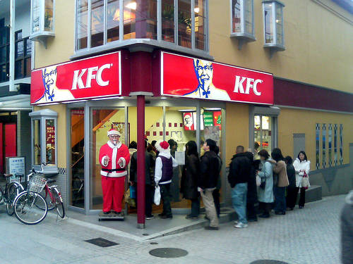 KFC receives its largest sales from Japan around Christmas, especially Christmas Eve. Lines often wrap around the store, some people waiting for 2 hours or more. Those dining in have usually reserved a table in advance.