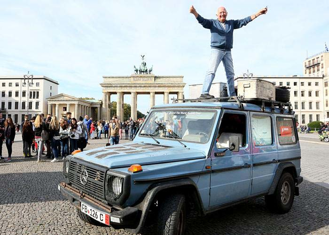 Christine insisted that Gunther must carry on the journey after she was gone. He did exactly that. In 2012, Gunther and Otto finally completed their journey visiting 177 countries in total (another 28 since Christine passed away). Here he is with Otto upon returning to Berlin.