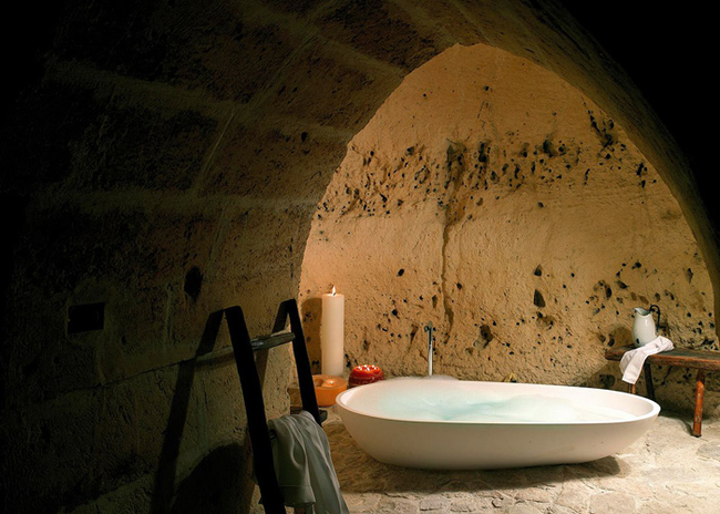 Though they mostly stick to the rustic aesthetic, bathrooms feature this luxurious Philippe Starck bathtub.