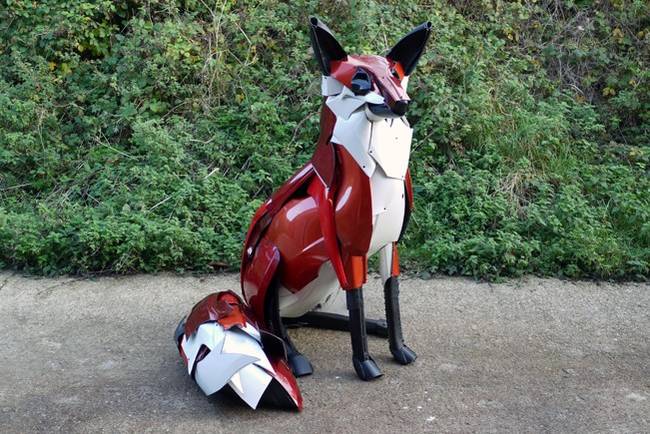 This fox was created using old bumpers instead of hubcaps, and was given a bright paint job.