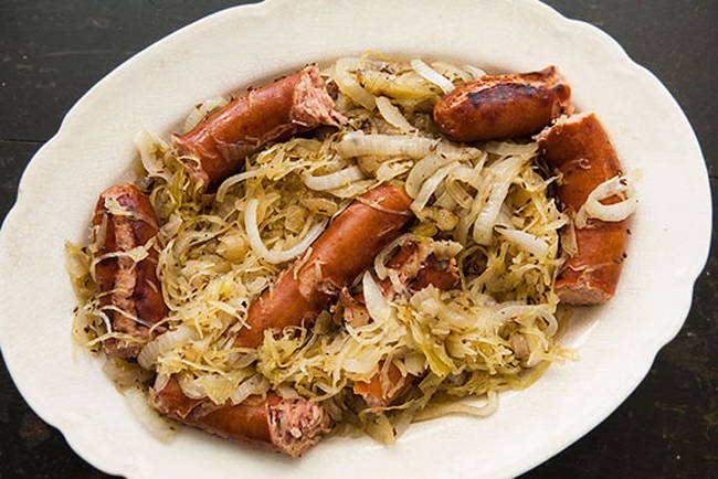 <a href="https://www.simplyrecipes.com/recipes/grilled_polish_sausage/" target="_blank">Sauerkraut and Polish Sausage</a>