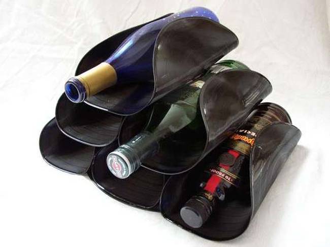 Melted records make a useful and cool wine holder.