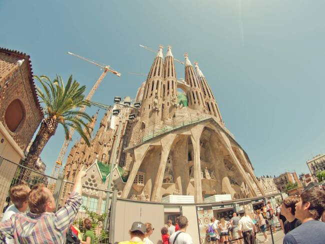 Construction continued post-war. Because original designs by Gaudi were damaged in the 30s, a series of architects joined in on the construction of the church, each adding their own flavor to its design. It is set to be completed in 2026, the centennial of Gaudi's death.