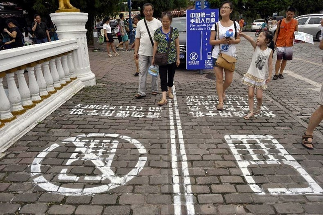 The lanes were supposedly installed to make people more aware of how much time they spend on their phone when they should be focusing on what they're doing.