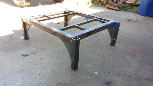 He started by making a frame from pieces of scrap metal.