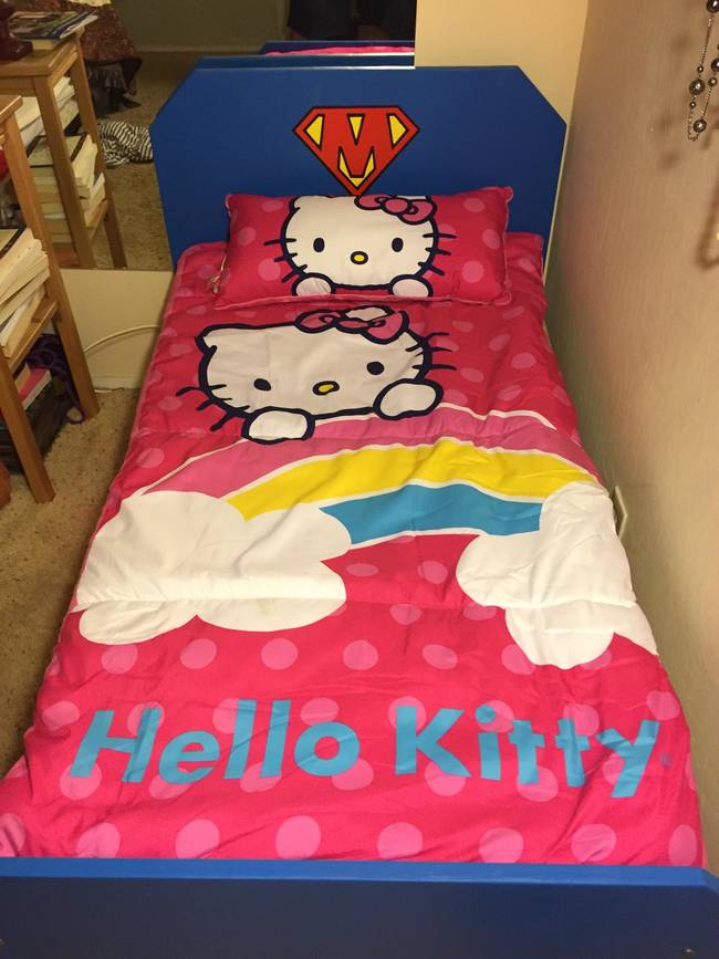 Turn the bed frame into an actual bed, fully equipped with a Hello Kitty comforter and pillowcase.