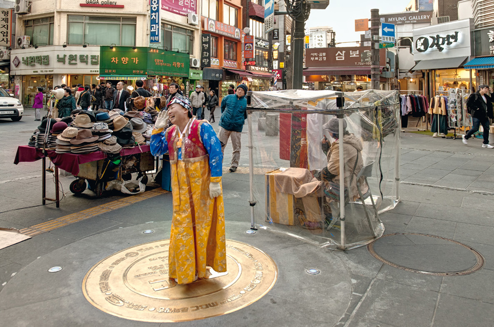 5.) Woman Working, South Korea