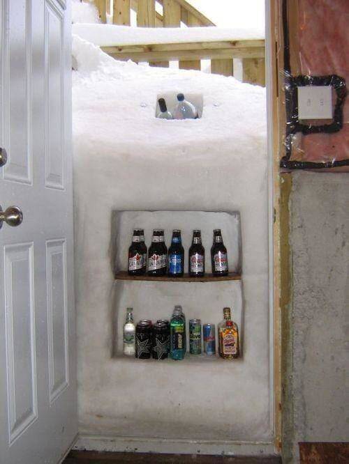 The answer is right in front of you this whole time. Why waste hours of time and energy moving the snow from your doorway when it's practically inviting you to turn it into a nifty fridge? Do what Zack Green did: make a snow fridge.