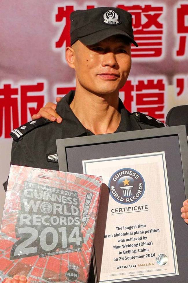 Here he is, proudly displaying his world record certificate.