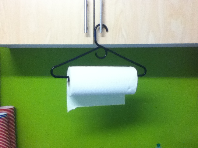 9.) Hang your paper towels on a clothes hanger.