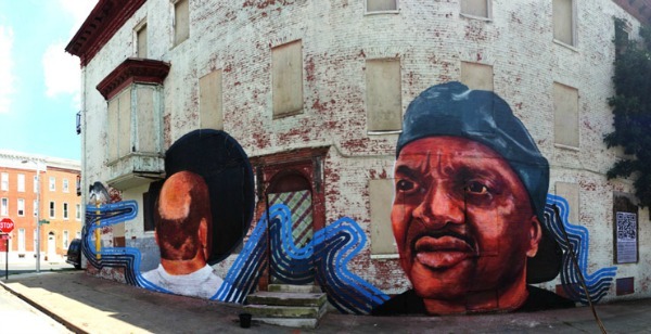 6.) Shaming Baltimore slumlords with art.