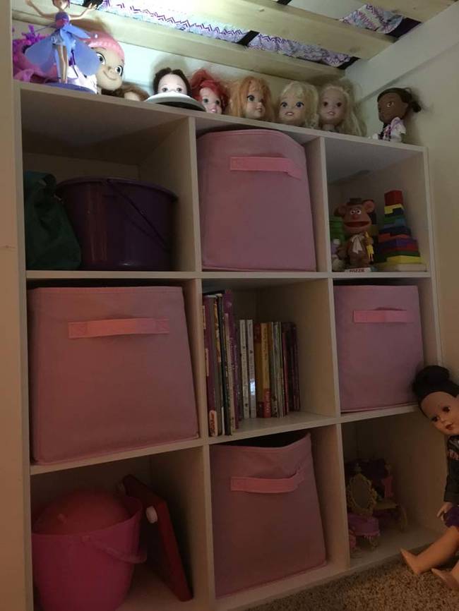 The inside features a toy storage area.