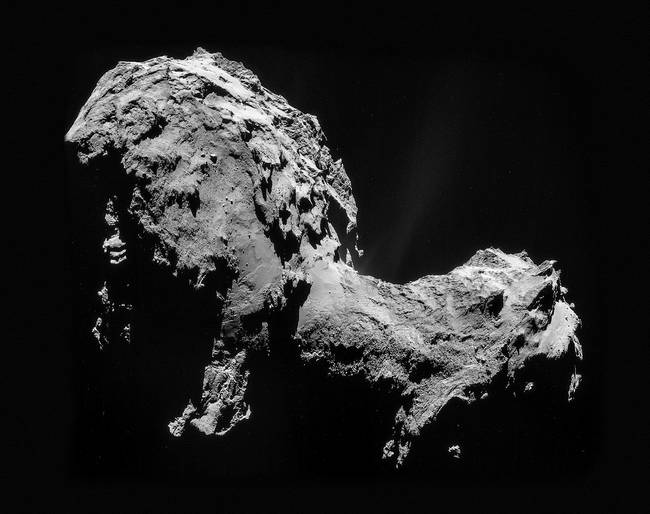 The comet from the perspective of <i>Rosetta</i>. Like most comets, it's composed of ice, dust and rocks, which lend it an irregular shape with spire-like protrusions.