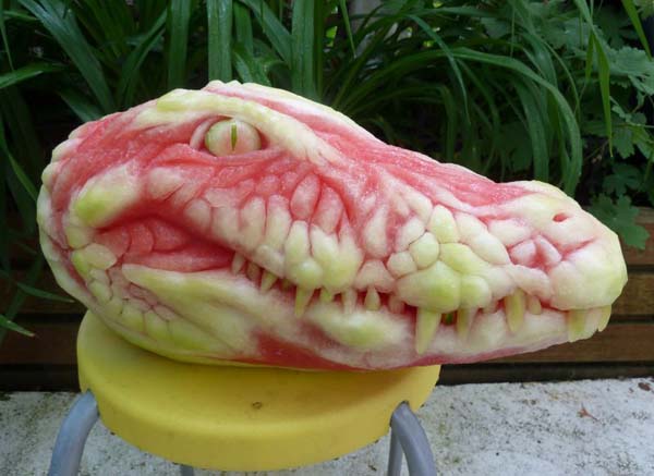 He made this work of art by carving watermelon like you would a pumpkin.