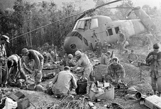 2.) U.S. troops begin their day in a daze after a third night of fierce fighting against North Vietnamese forces.