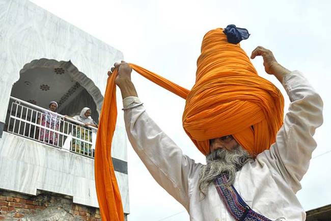 For comparison, the average turban worn by men who follow Sikhism measures about 16 to 23 feet of fabric. Singh figured he could do better.