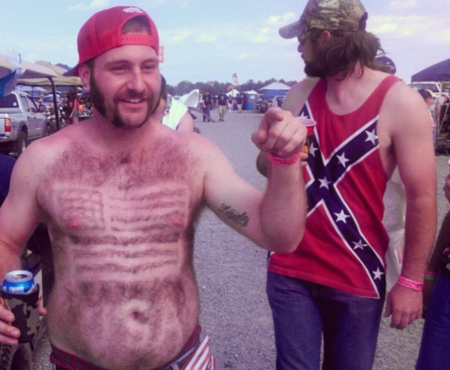 I bet that guy with the stars and bars couldn't grow that onto his body. Sucker.