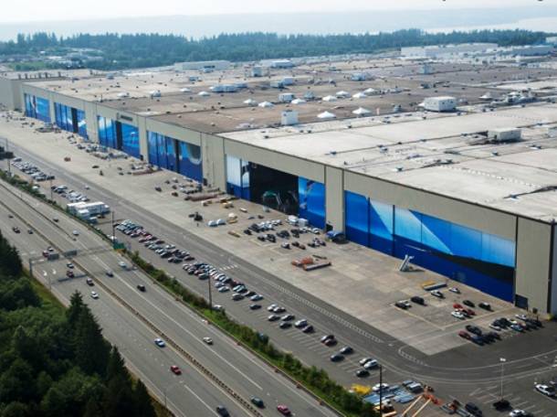 14.) With 100 acres to work with for building 747 planes, the Boeing Factory, in Everett, Washington is the largest by volume in the world.