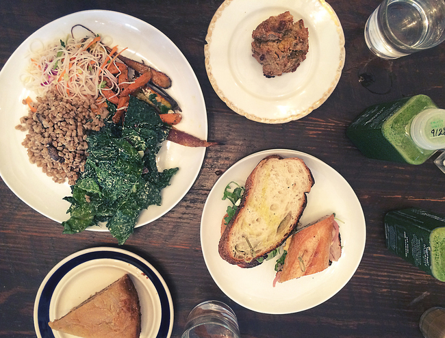 She was rewarded with an egg sandwich, roasted pork sandwich, kale salad, sesame-soba noodle salad, roasted carrots, truffle oil wheatberry salad, a slice of caramelized apple-honey cake, and two Morning Green juices.