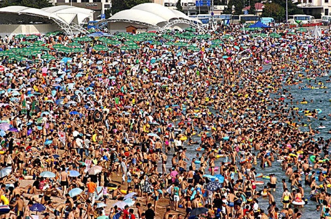 9.) Qingdao Huiquan Beach AKA "The World's Most Crowded Beach" - Shandong, China