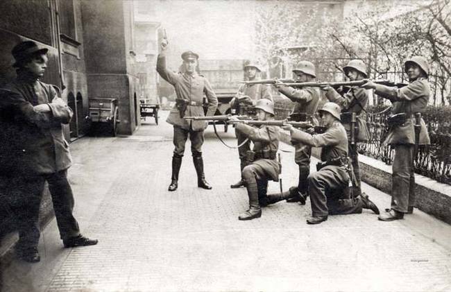 German soldiers execute a defiant communist in Munich, 1919.