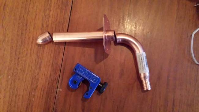 They cut up copper plumbing parts to make the spout.