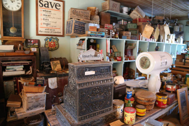 A general store-style setting, complete with an ornate cash register.