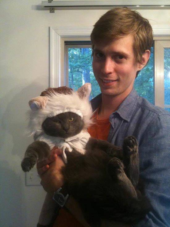 Sorry, is this guy dressing his cat up as a different colored cat?? I just...I don't understand.