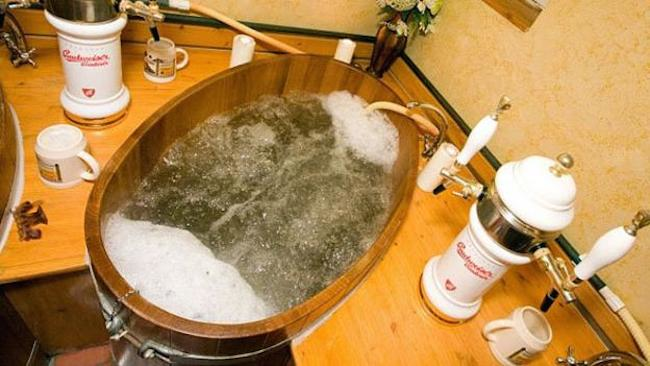 It's not just a hot beer bath. You'll also get a hot beer massage. That sounds like a euphemism for getting physically kicked out of a bar, but it's not. (At least, not in this scenario.)