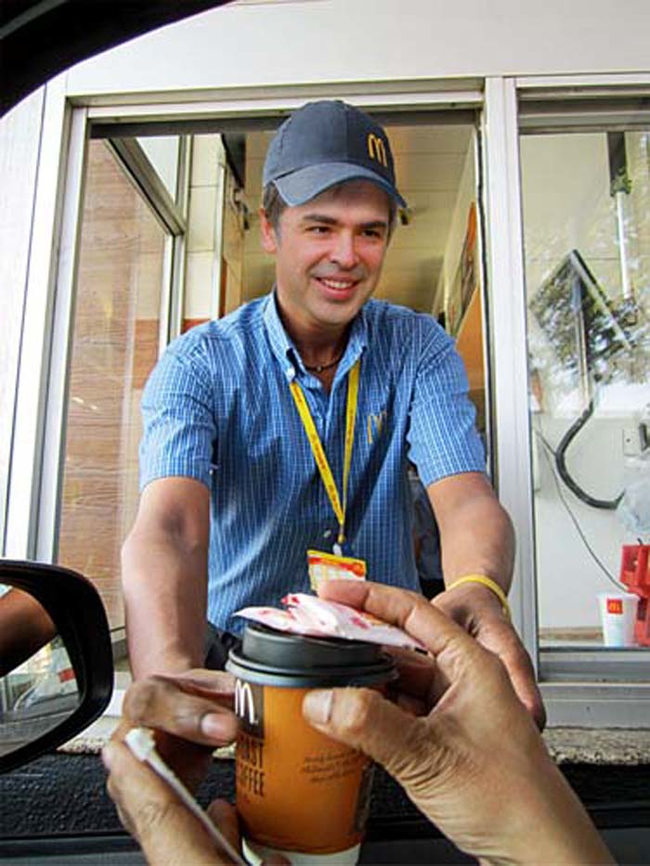 14.) Larry Page working at McDonald's. Net worth: $31.7 billion.