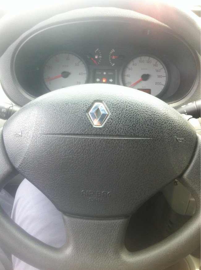 3. This steering wheel looks like a smiling sloth.