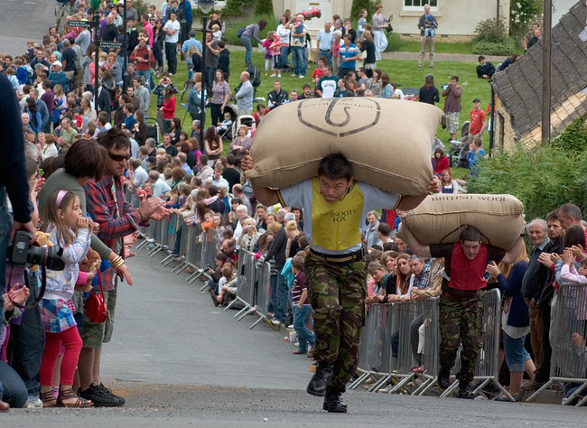 13.) Woolsack Races: People of the world, I give the most British sport ever invented. A bunch of Brits get together and see who can run up a gentle slope the fastest with a giant bag of wool on their backs.