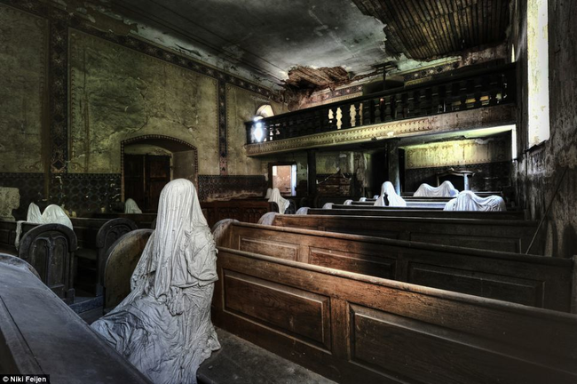 Someone placed these nine eerie figures in an abandoned church. They're cloth and plaster sculptures, but no one seems to know why they're here.