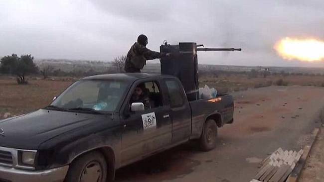 However, there is another theory regarding how Oberholtzer's truck appeared in Syria: it's not actually there. This photo of a nearly identical scene surfaced not long after the photo of Oberholtzer's truck. Could this picture have been altered to include Oberholtzer's business' logo and contact info? If so, why?