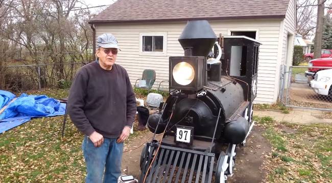 The number at the front is in reference to the old country song, "Wreck of the Old 97," which details the crash of an old postal train in the early 1900s.