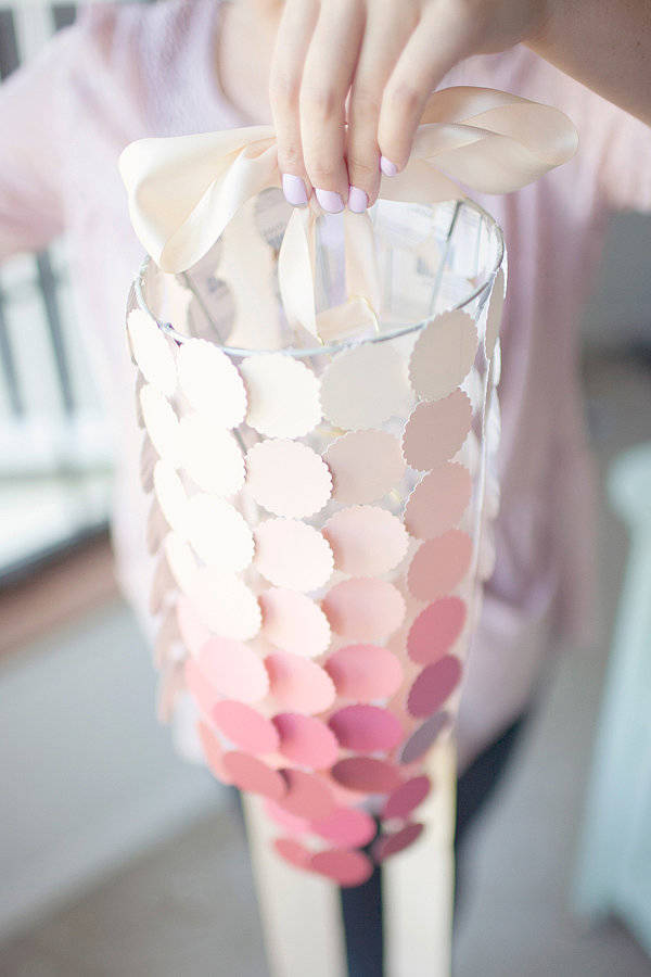 Make a paint chip chandelier.