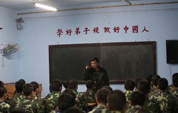 The kids are also given lessons in Chinese ethics and culture. Instructors and ex-soldiers teach them.